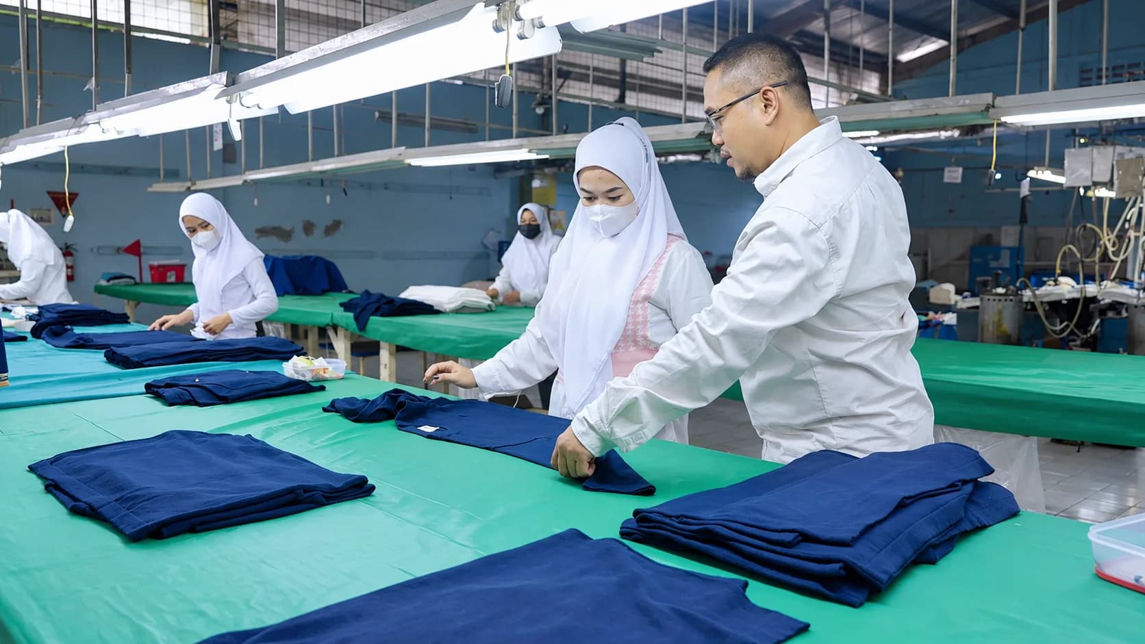 Finished garments on a rack awaiting final inspection